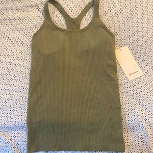 Size 6, darker lime green lululemon tank